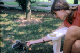 1966-12 001 Anna feeding a squirrel
